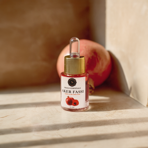 Skalli Essentials Aker Fassi bottle, an organic Moroccan beauty product for lips and cheeks, offering a natural, radiant tint with traditional ingredients.