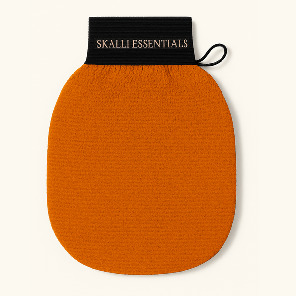 Moroccan Kessa Mitt paired with saffron orange soap for a natural exfoliating experience that leaves your skin radiant and soft.