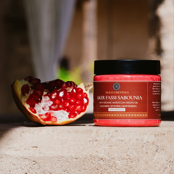 Aker Fassi Sabounia with organic Moroccan argan oil, paired with fresh pomegranate for a natural facial cleanser and skin softener.