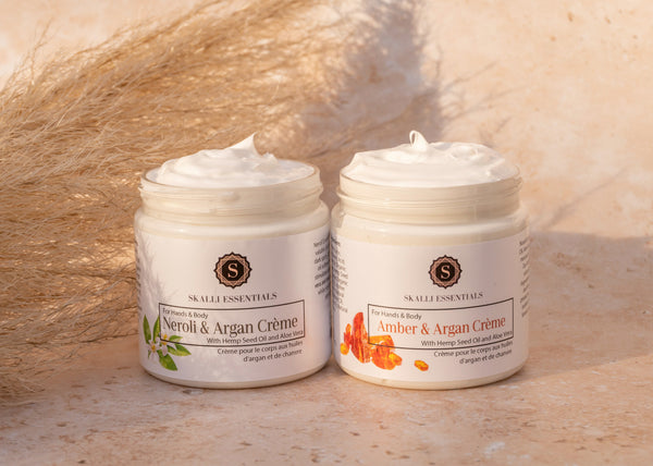 Model enjoying the benefits of Skalli Essentials Nila & Argan Mask, a natural skincare treatment for glowing, brightened skin.