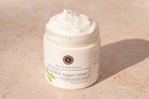 Skalli Essentials Nila & Argan Mask being applied to skin for brightening and hydrating benefits, enriched with rose water and honey.